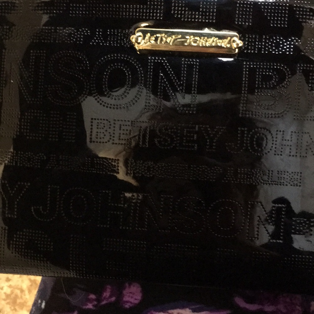 Betsy Johnson clutch with built in phone charger